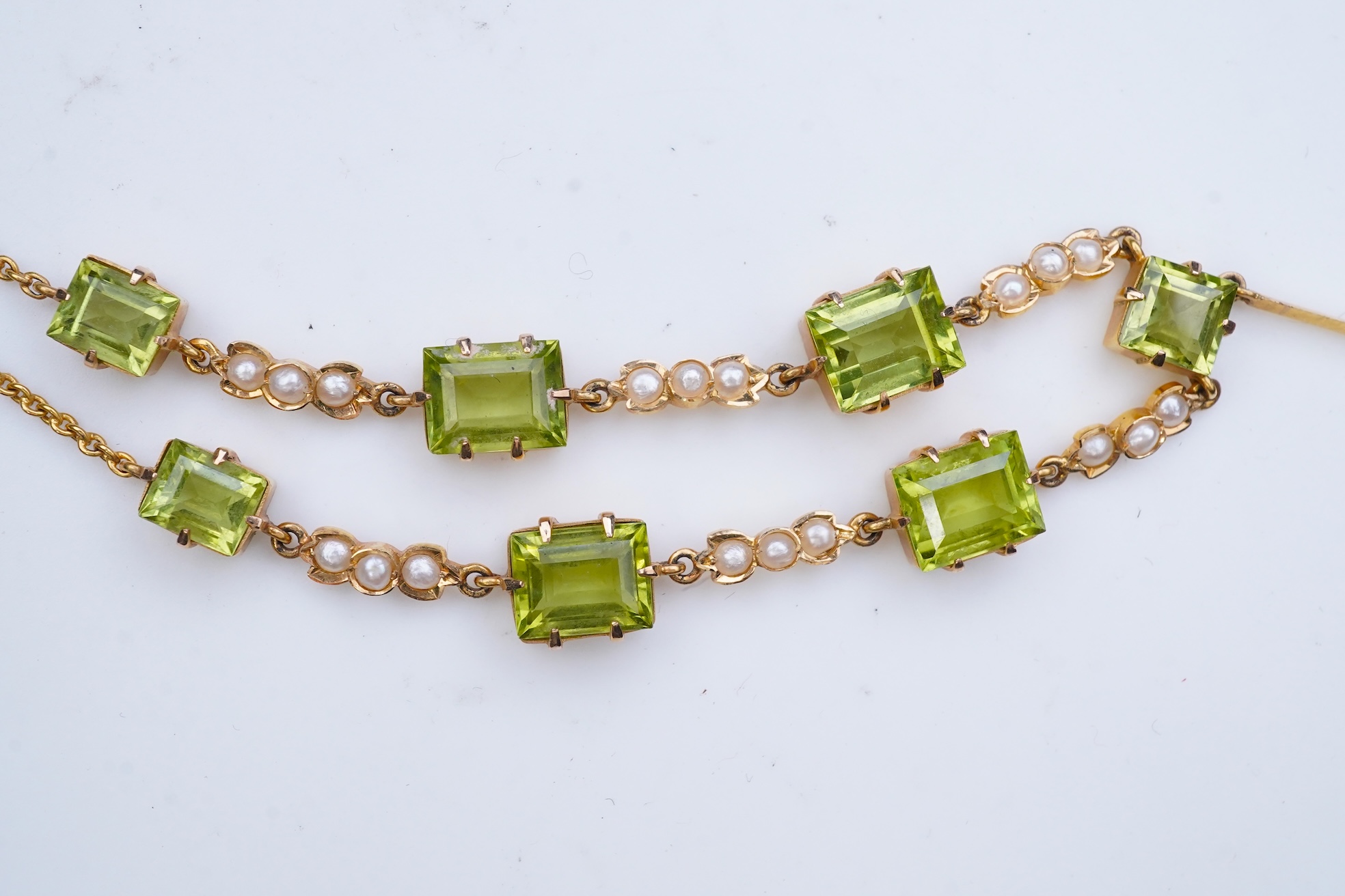 An Edwardian peridot and seed pearl necklace, early 20th century